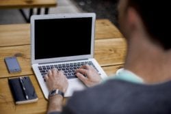 man working at computer