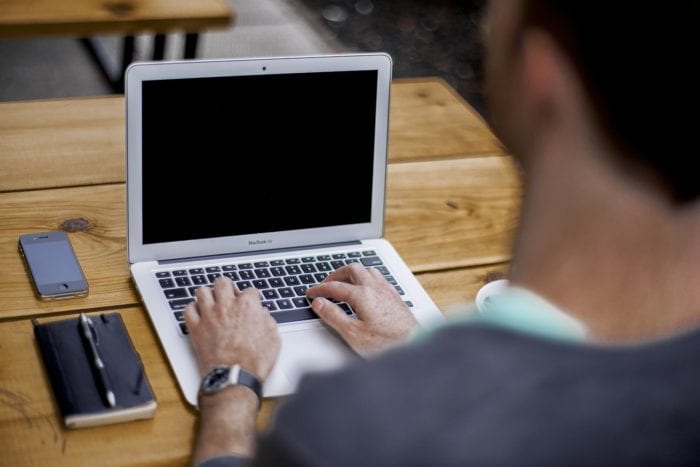 man working at computer