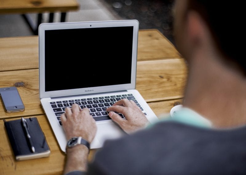 man working at computer