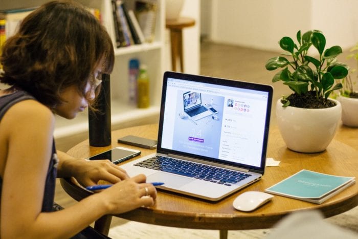 woman working at laptop from home