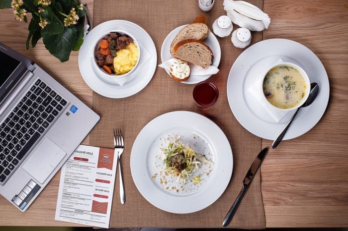 food in front of a laptop